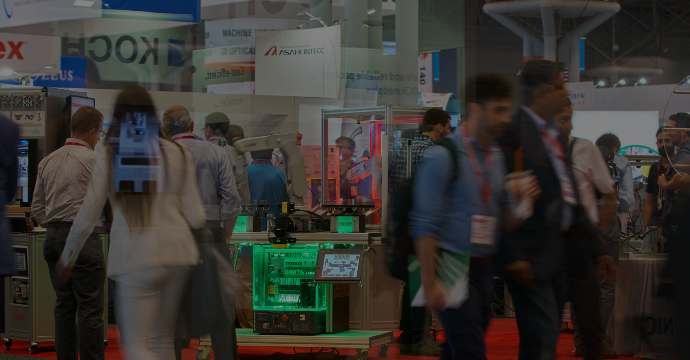 People exploring exhibits on expo floor